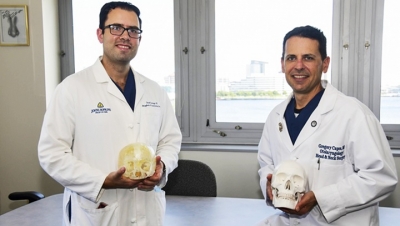 Navy Cmdr. Gregory Capra, a rhinologist and anterior skull base surgeon, and Navy Lt. Cmdr. Gabriel Santiago, a neuroplastic surgeon, teamed up to perform a new, minimally invasive surgery to remove a tumor from a patient’s sinuses.