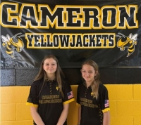 Cameron Middle School Archers (left) Hayle Parker and (right) Leighton Dyer