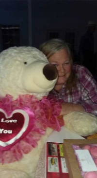 Bonnie Walton with the Teddy Bear (donated by Jessica Watts) that she won at the Valentines Day Dinner sponsored by the Talihina Chamber of Commerce and Visitors Center at Pistols and Pearls.